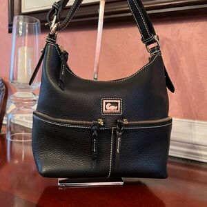 Dooney and Bourke Small Pebble Leather Dillen Black Shoulder bag.